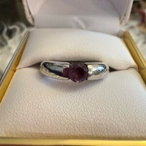 Elegant Silver Ring with Purple Gemstone